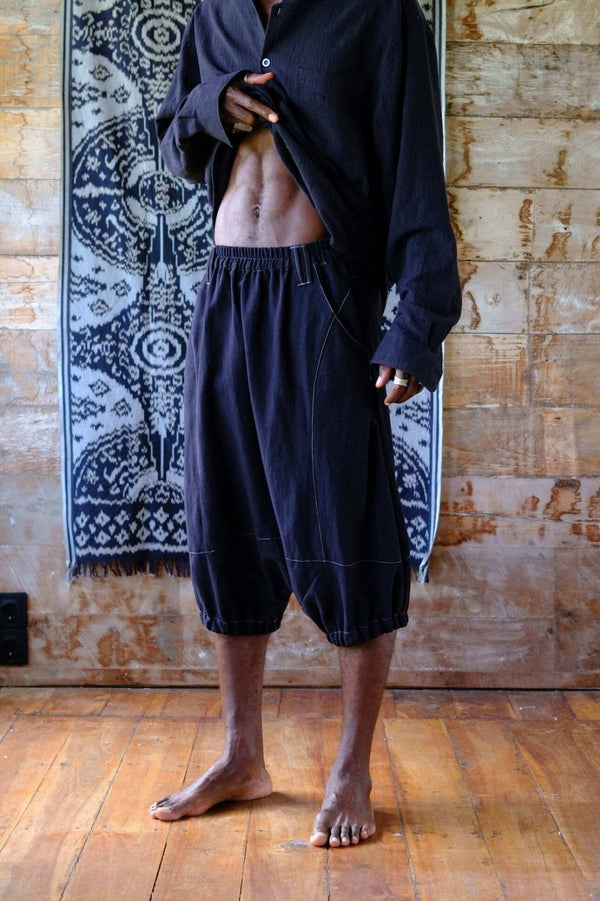 Black flowy pants, Canggu pool-to-sunset wardrobe