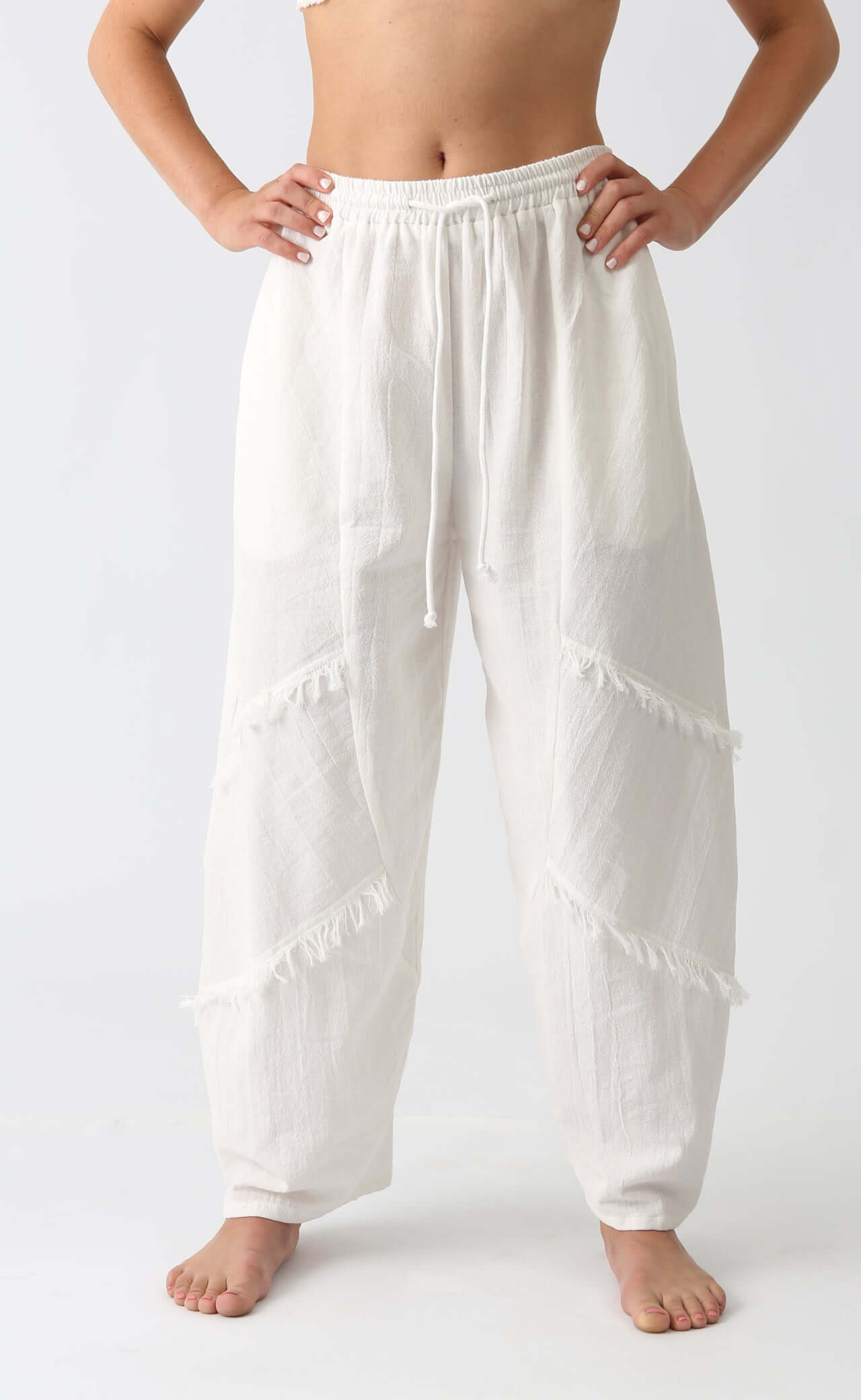 Snow Flow Pants in relaxed fit with wide leg design, crafted from 100% cotton for effortless style and comfort.