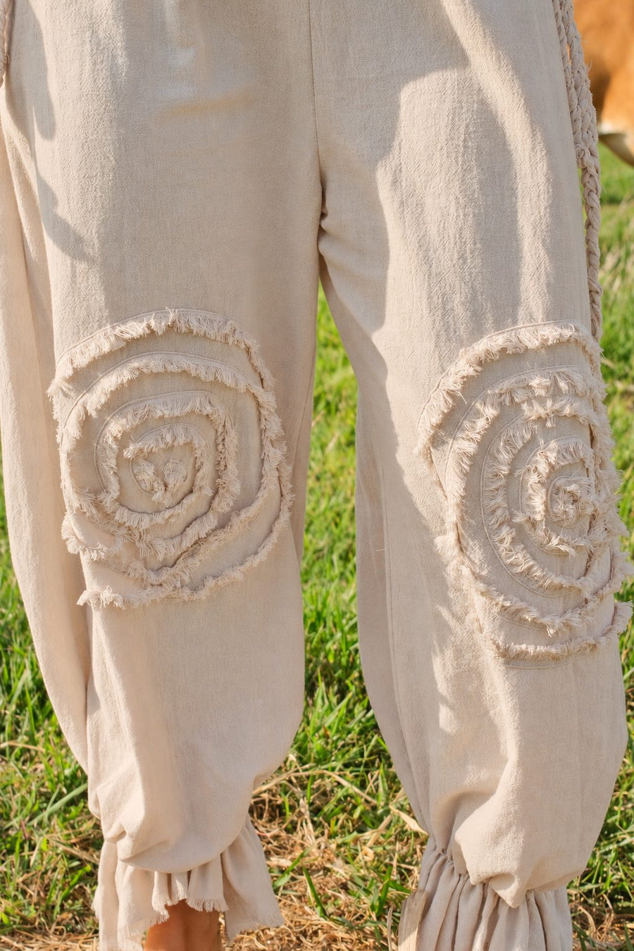 Intuition Pants in cream — spiral detail