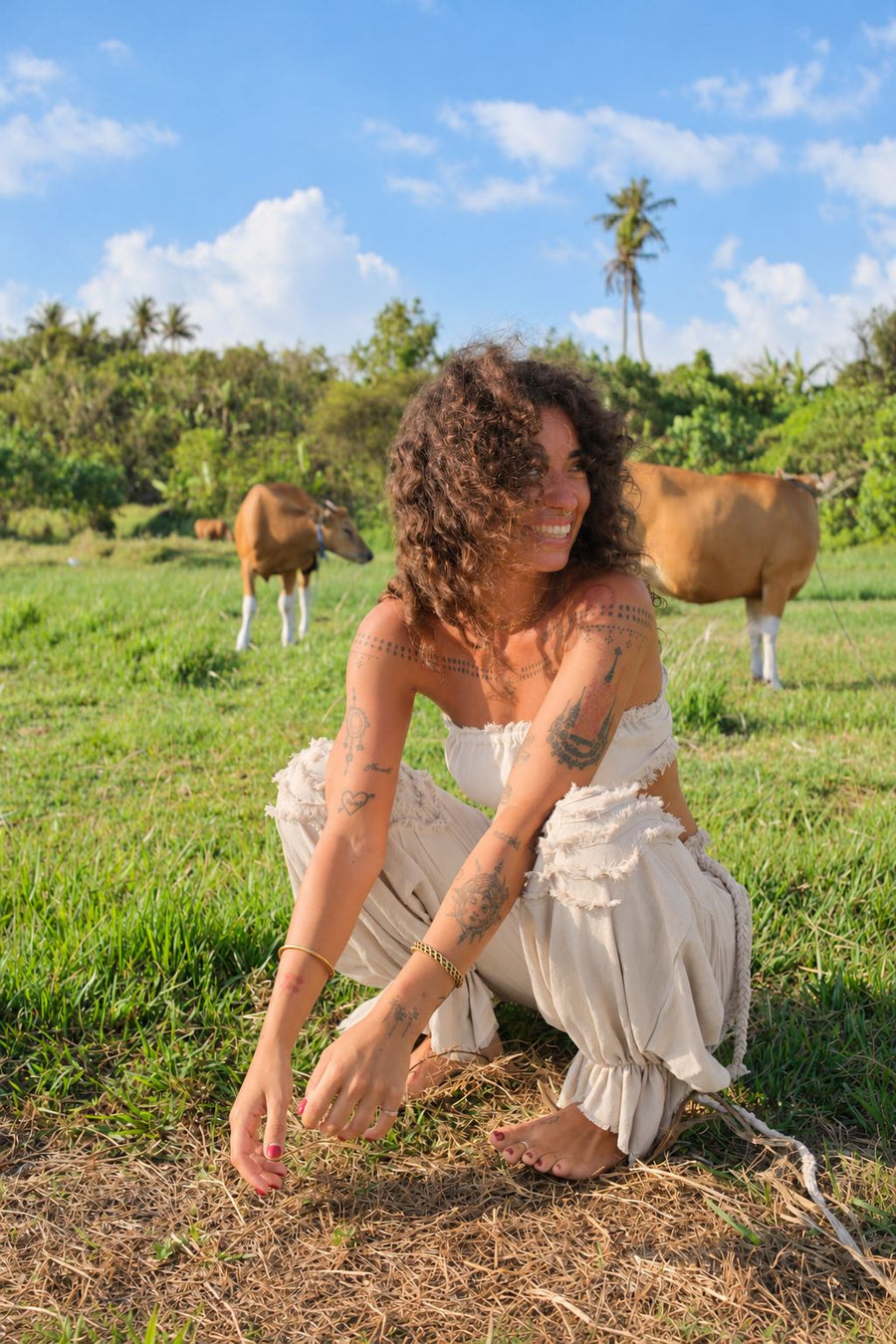 Intuition Pants in cream — smiling sitting pose
