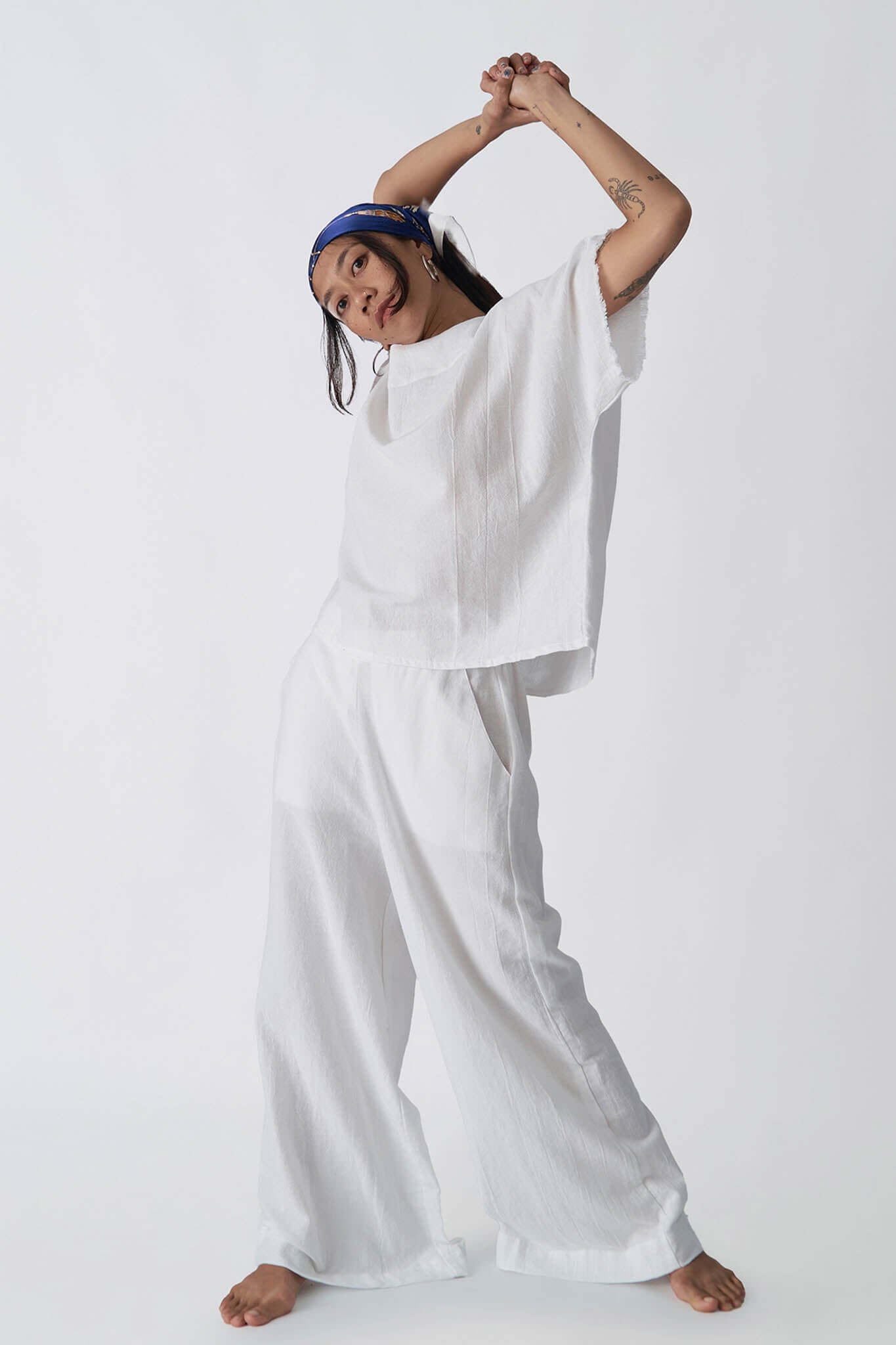 Snow Solace Top - Woman in breathable 100% cotton, relaxed fit, perfect for summer outfits and daily comfort wear.