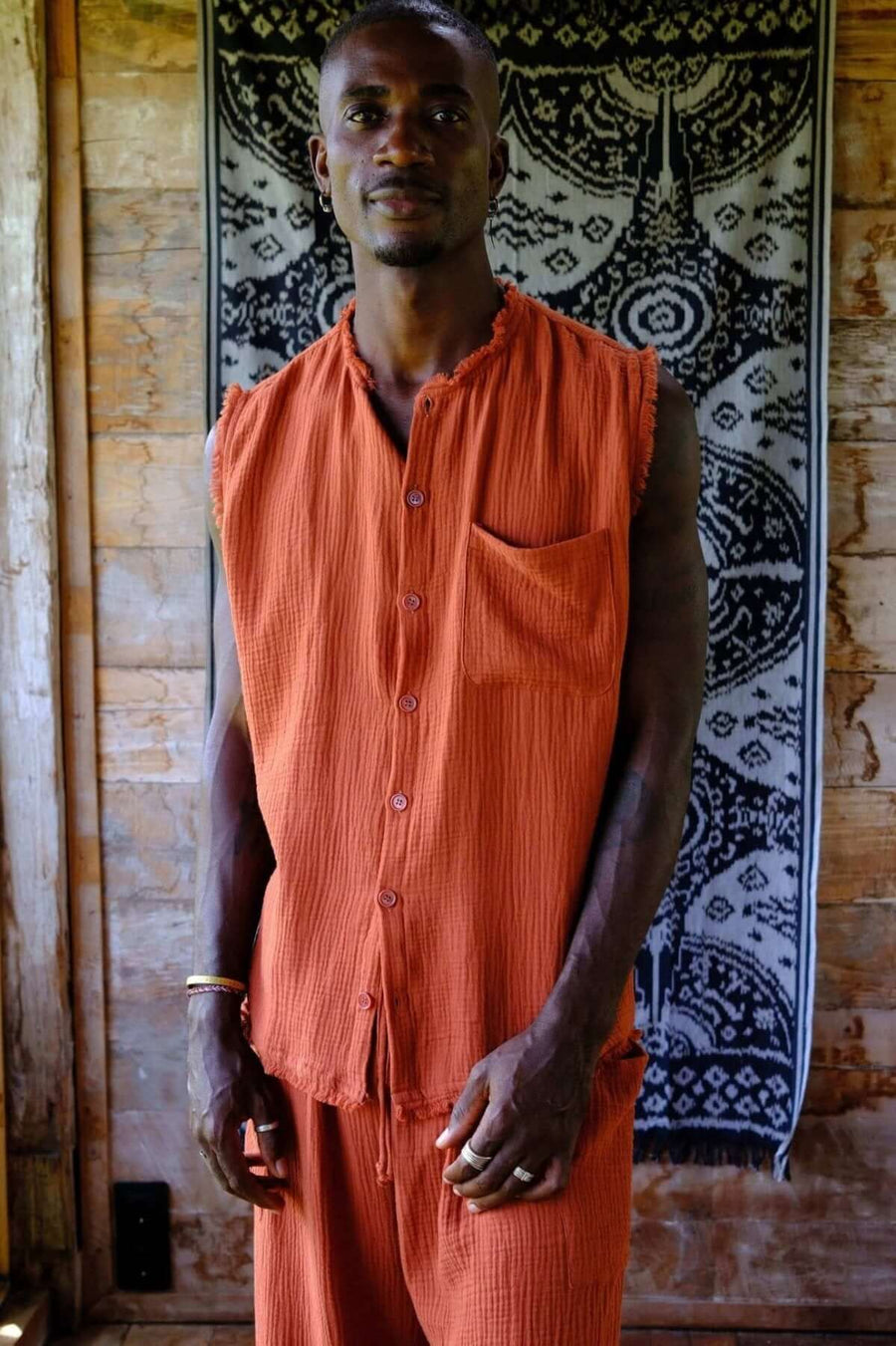 Terracotta Sleeveless Shirt Tee worn by a model, showcasing a relaxed fit and breathable summer wear style.